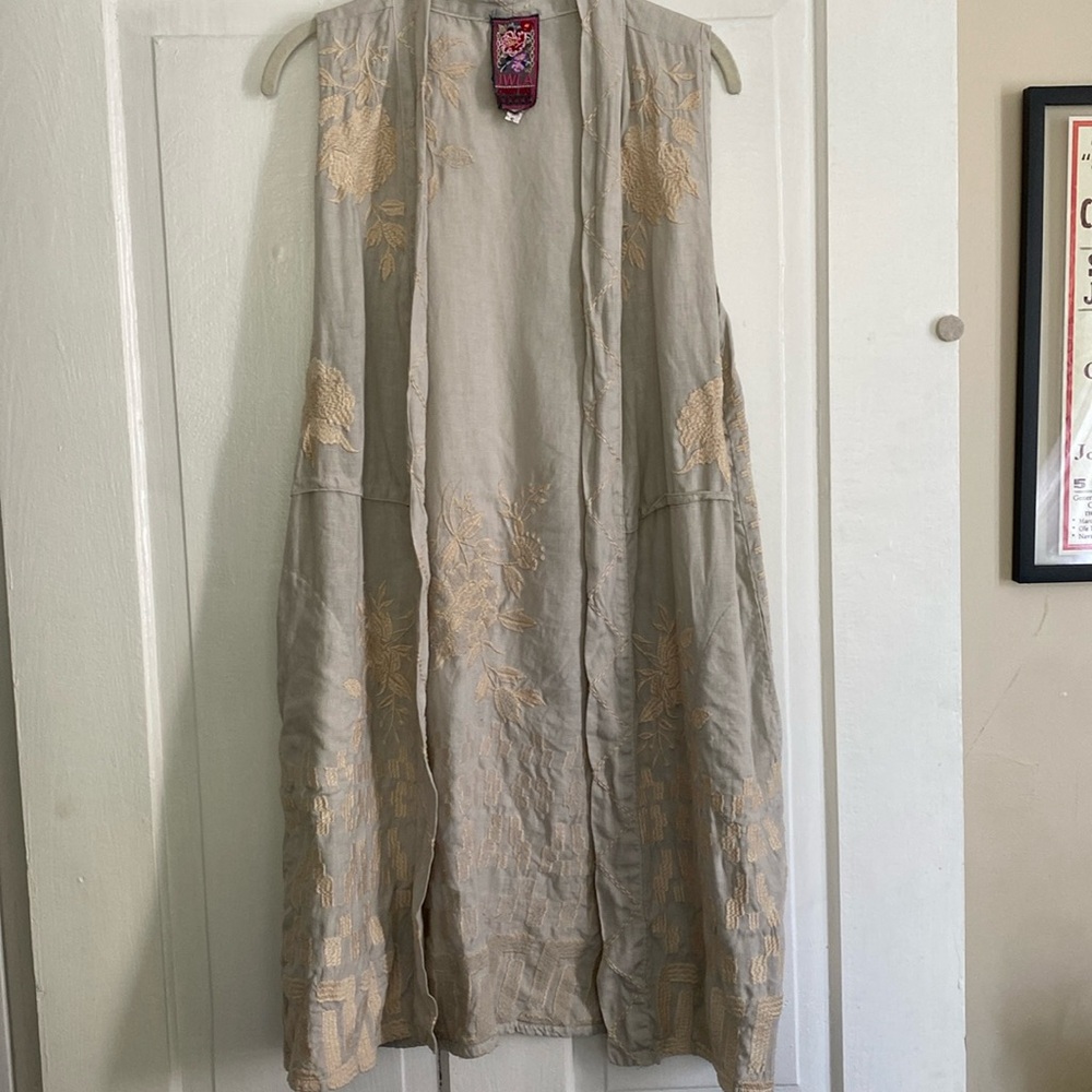 Johnny was embroidered long vest with pockets.